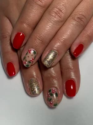 Solid red nails with gold glitter and green holly berry floral accent nails.
