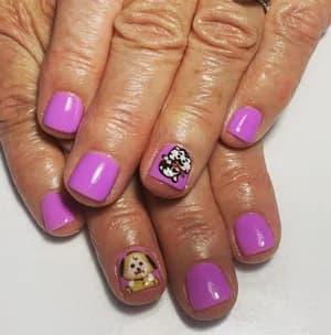 Lilac purple nails with leopard-print accent and a hand-painted puppy character design